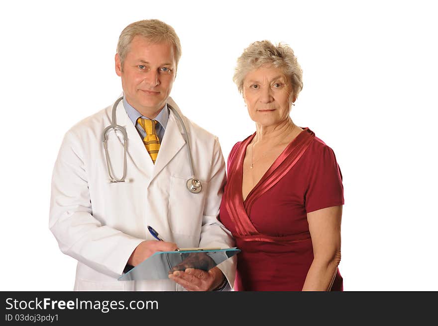 A Doctor taking notes with a patient. A Doctor taking notes with a patient