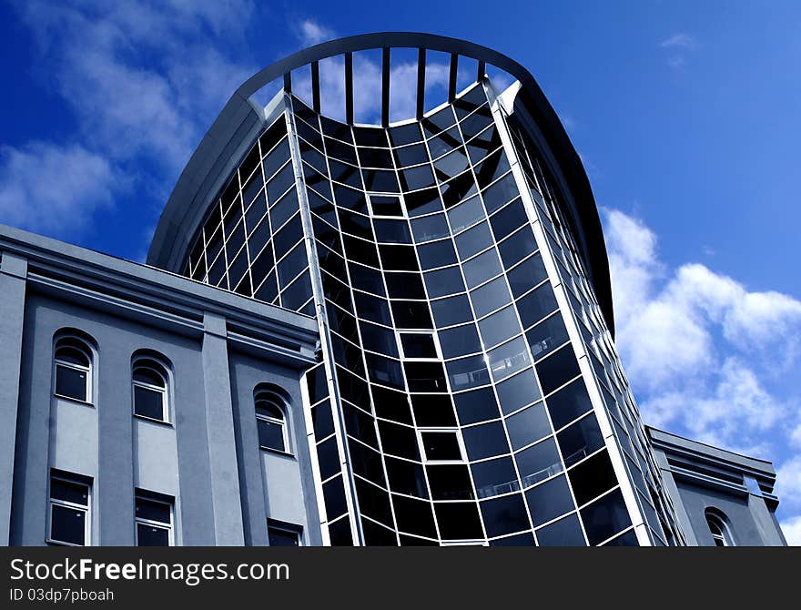 a modern many-storeyed building of business centre. a modern many-storeyed building of business centre.