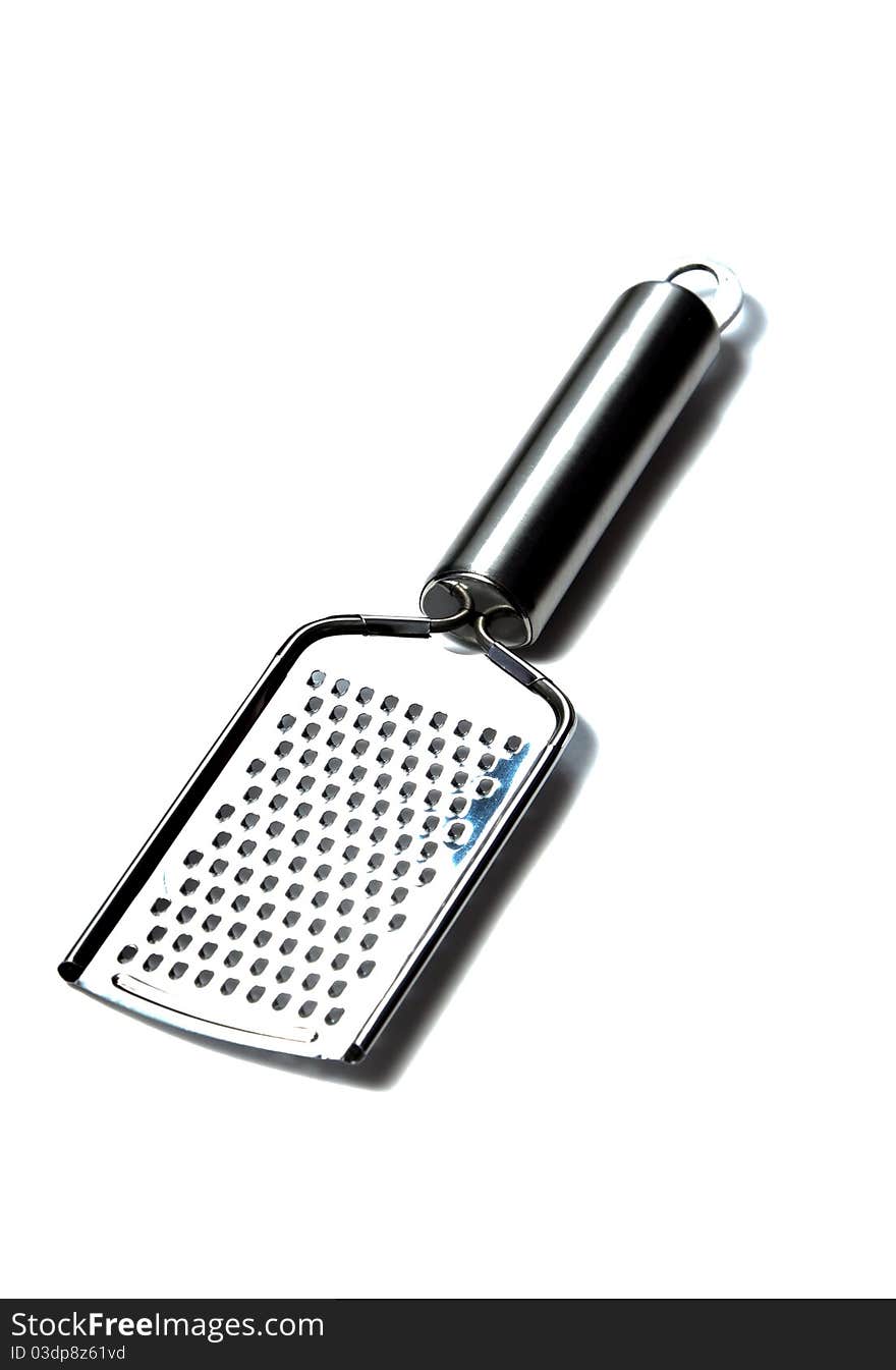 A Stainless Kitchen grater isolated used for cheese and fruits