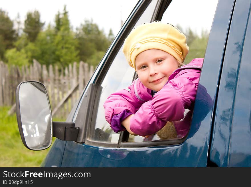 The girl in the car.