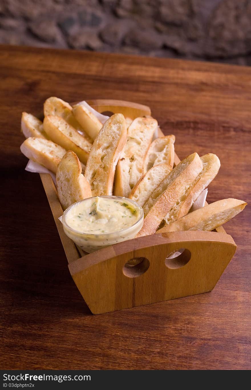 Garlic crusty bread in a basket.