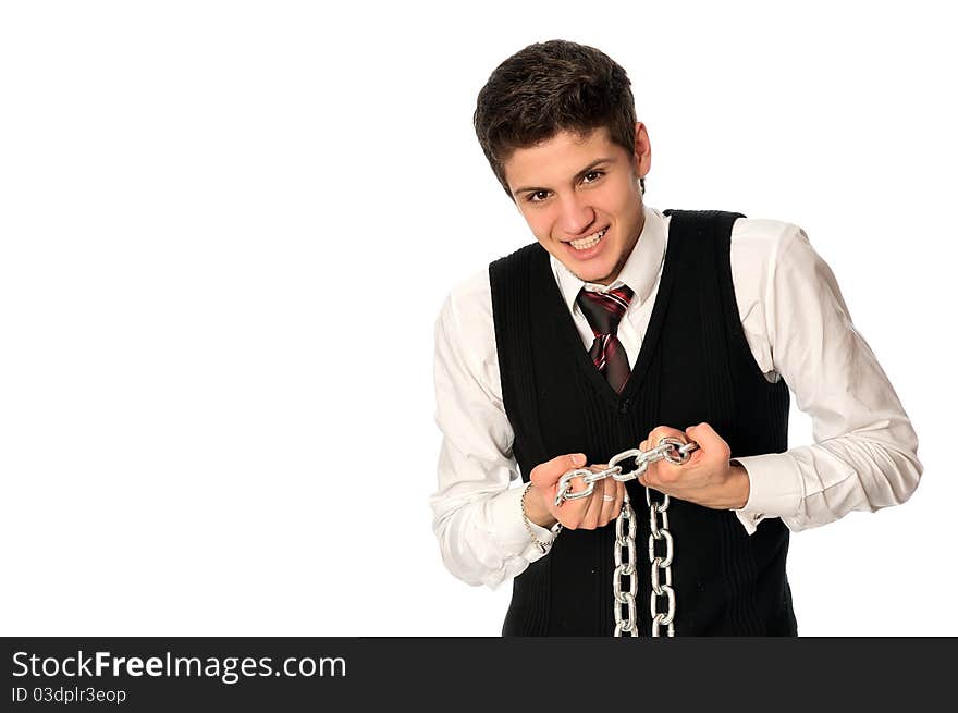 Businessman breaking the chain by hands for liberation as a symbol of work captivity