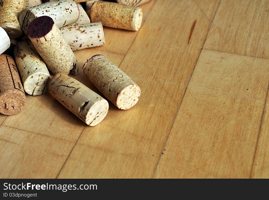 Corks on maple wood floor