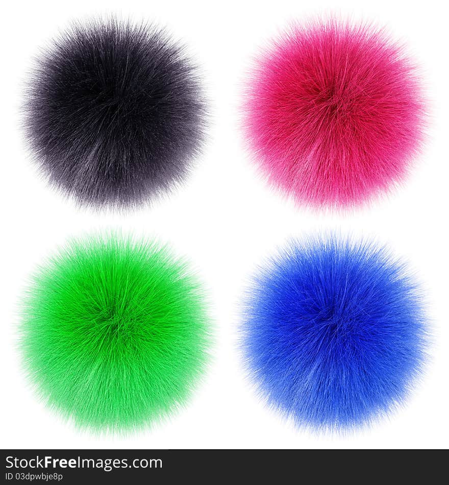 Fluffy balls on a white surface
