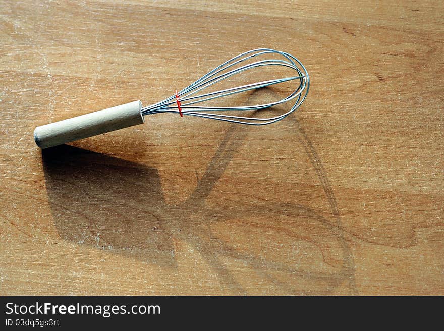 An image of a whisk on the kitchen table