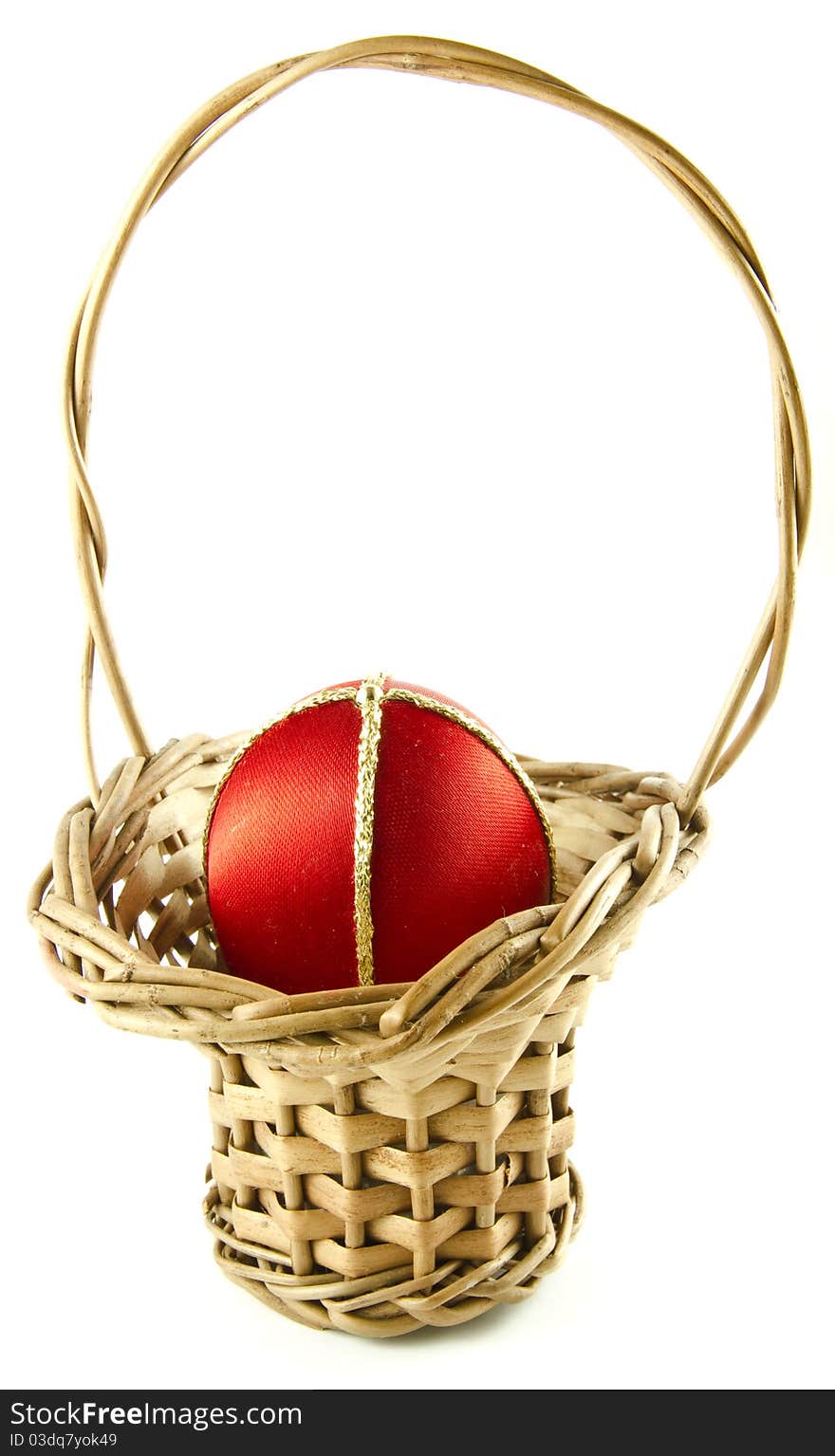 Easter egg in a wattled basket