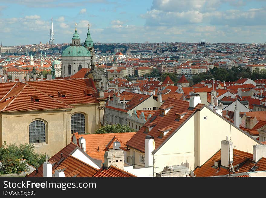 St. Nicholas Church and the red roofs in Prague