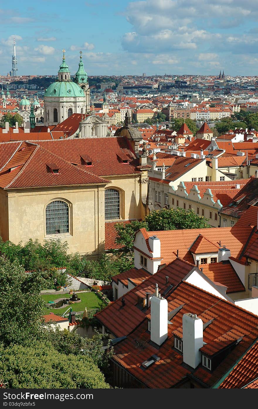 St. Nicholas Church and the red roofs in Lesser Town, Prague, Czech Republic. St. Nicholas Church and the red roofs in Lesser Town, Prague, Czech Republic