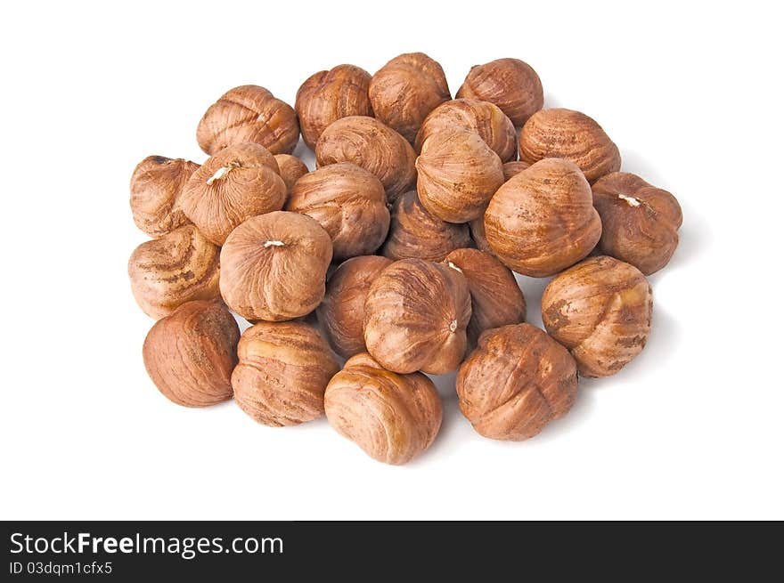 Isolated handful of big kernels hazelnut on white background. Isolated handful of big kernels hazelnut on white background