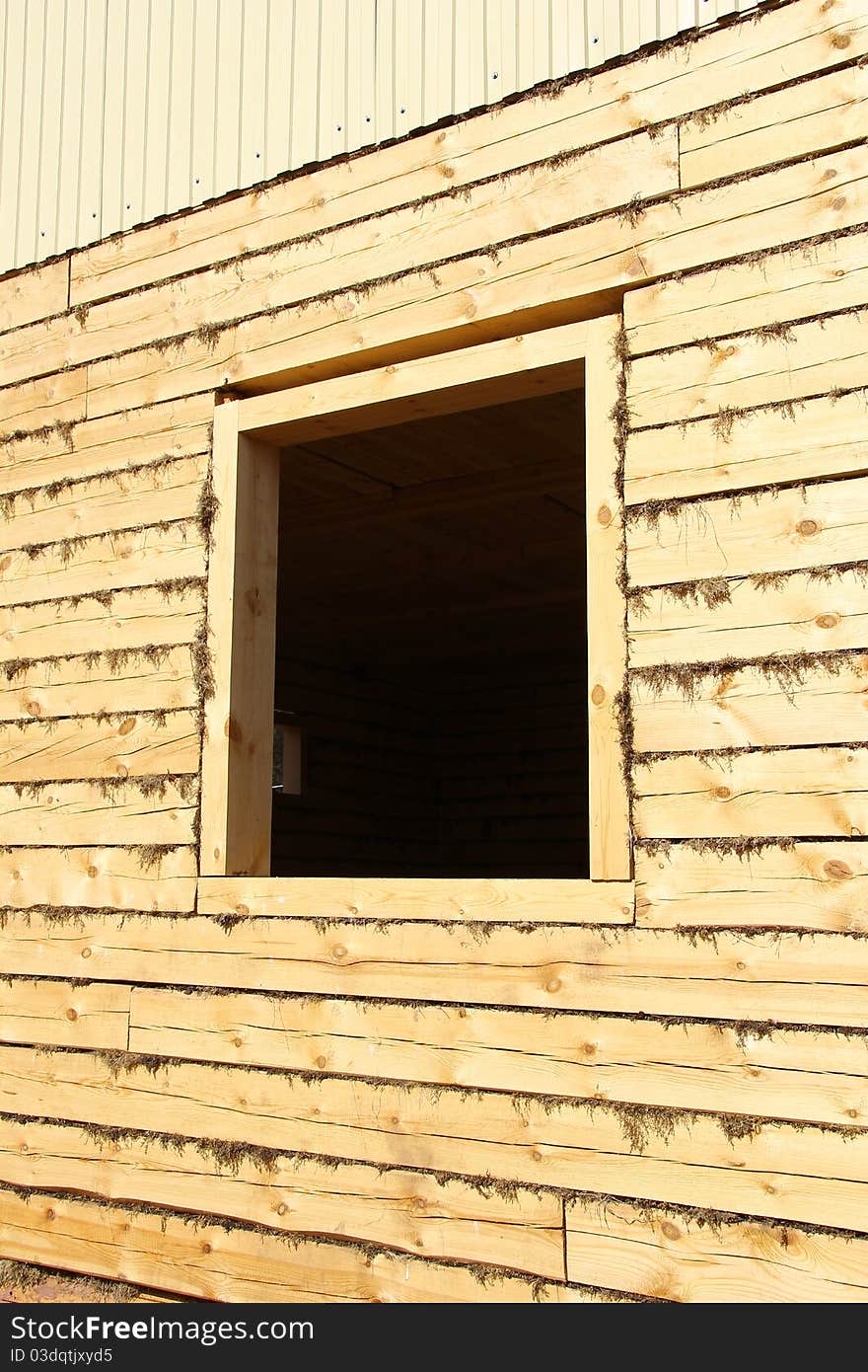 Window opening in the new log houses