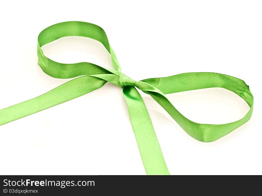 Decorative green bow isolated on white background