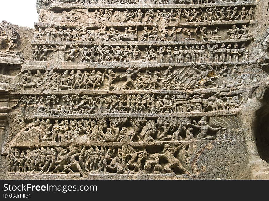 Bas-relief picture portrayed in the ancient man-made cave in Elora, India.