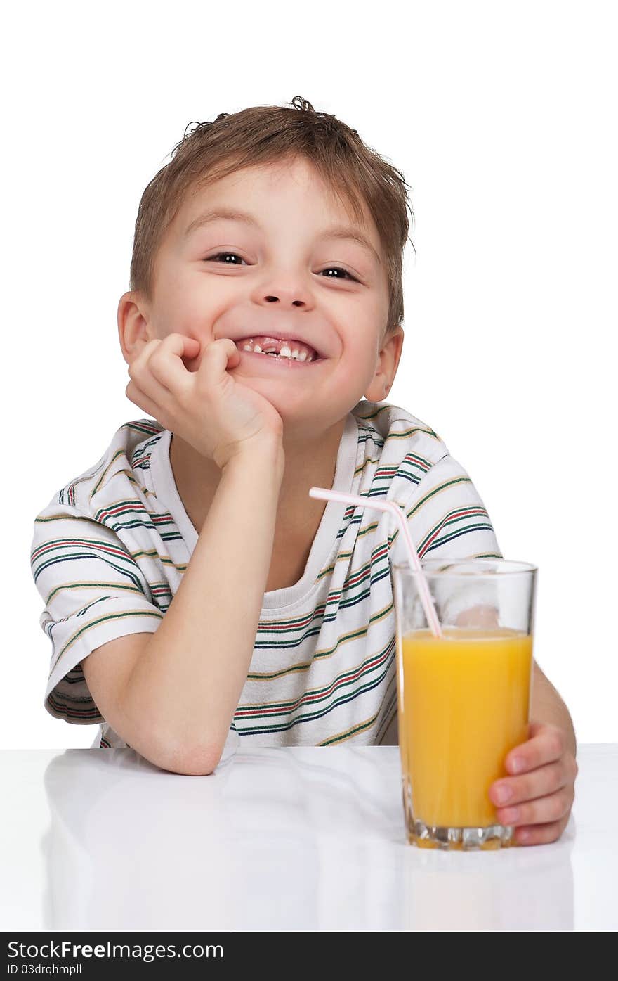 Little boy having a glass of refreshing oranges juice - isolated on white. Little boy having a glass of refreshing oranges juice - isolated on white