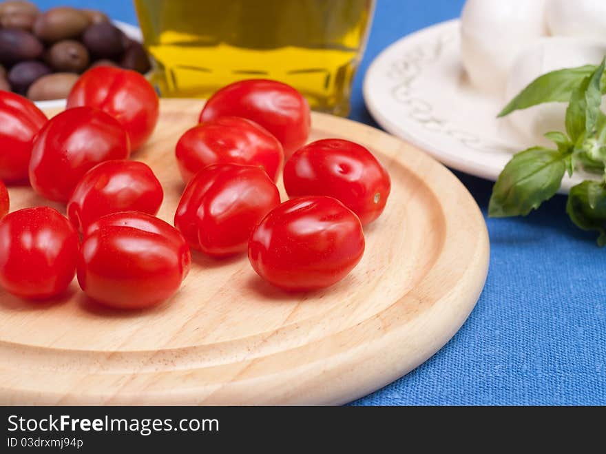 Cooking Caprese salad.