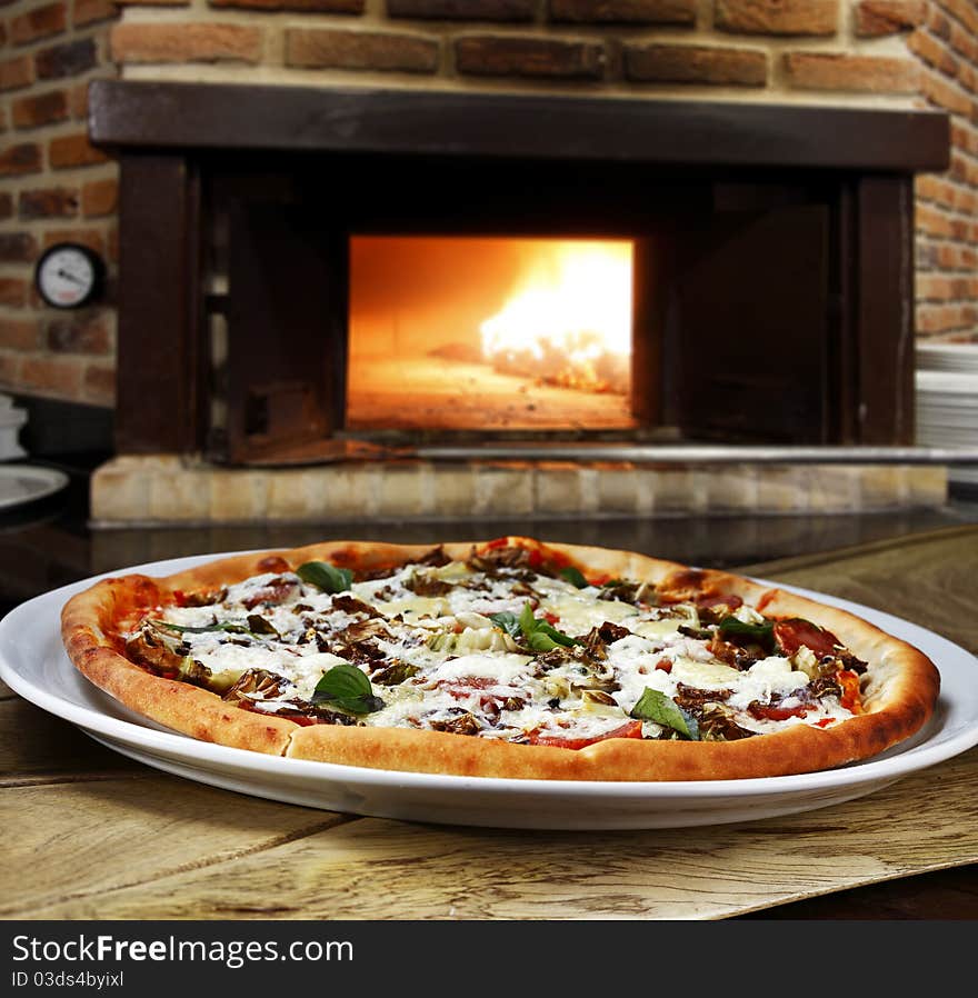 Pizza baked in wood oven