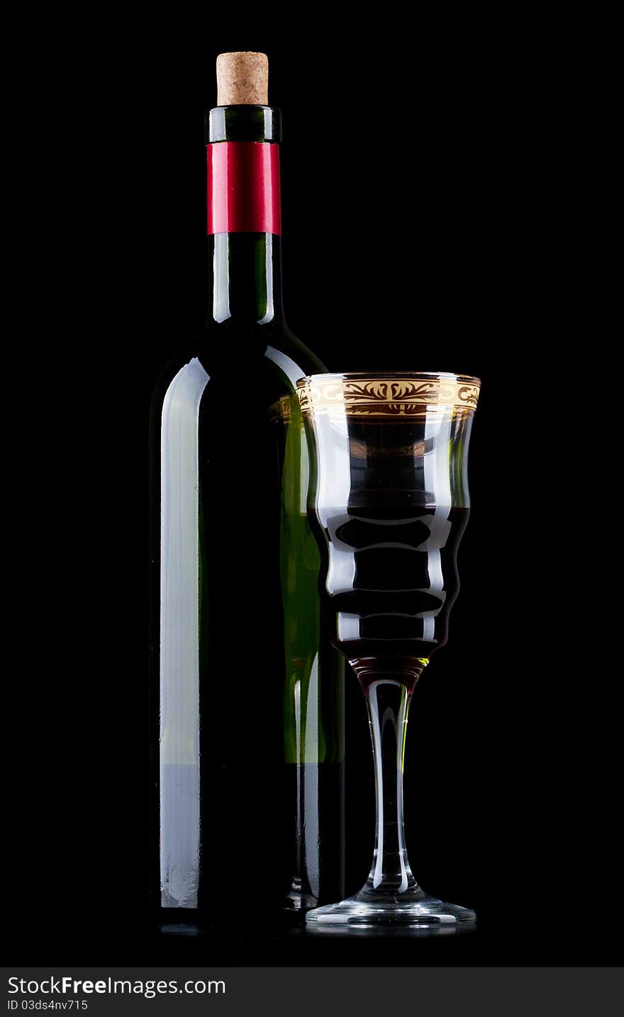 Wine bottle and wineglass