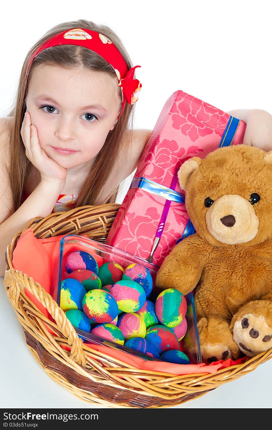 Cute little girls with Easter eggs and gifts isolated on white. Cute little girls with Easter eggs and gifts isolated on white