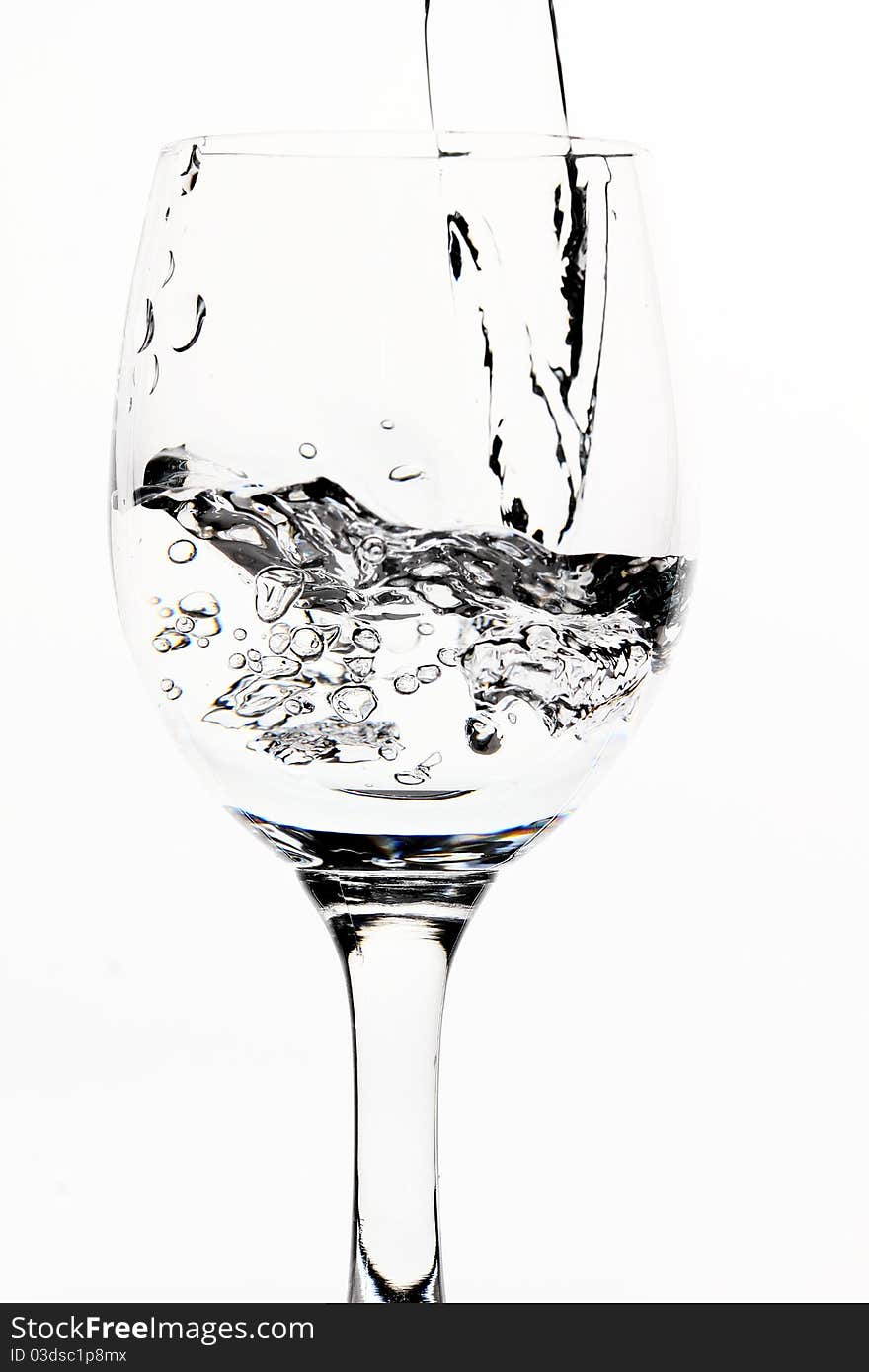 Glass and water on white backgroung