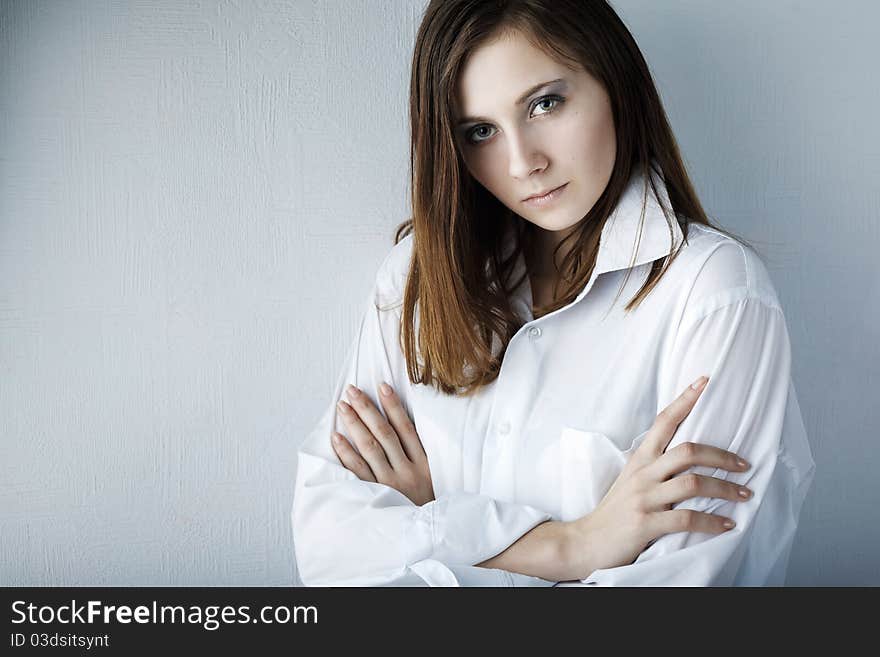 Portrait of a beautiful female model on white background