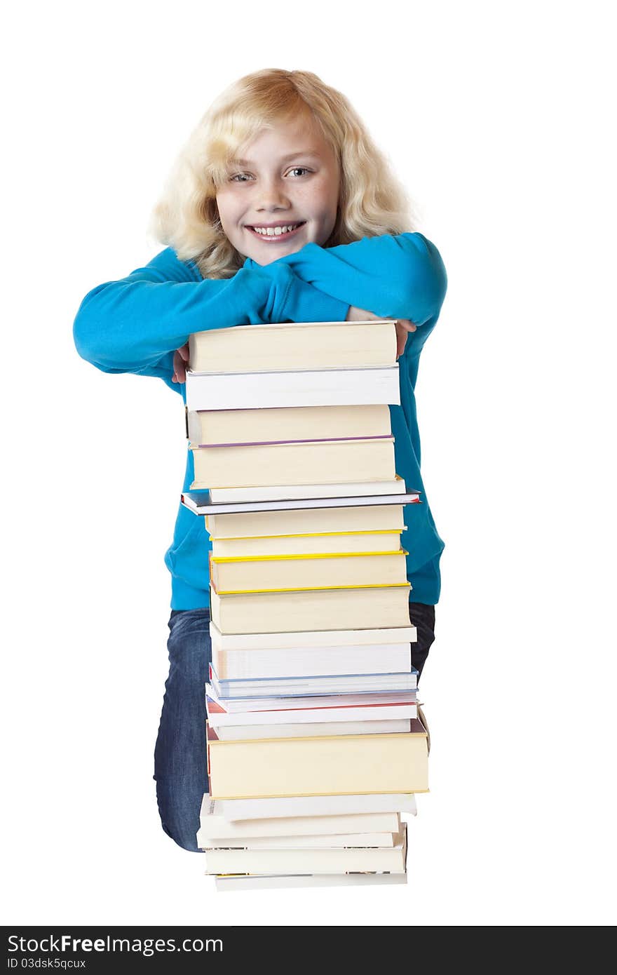 Young beautiful girl leans on pile of books and smiles happily.Isolated on white background. Young beautiful girl leans on pile of books and smiles happily.Isolated on white background.