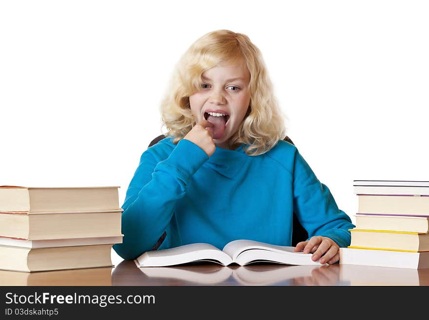 Young blonde pretty schoolgirl is upset because of homework.Isolated on white background. Young blonde pretty schoolgirl is upset because of homework.Isolated on white background.