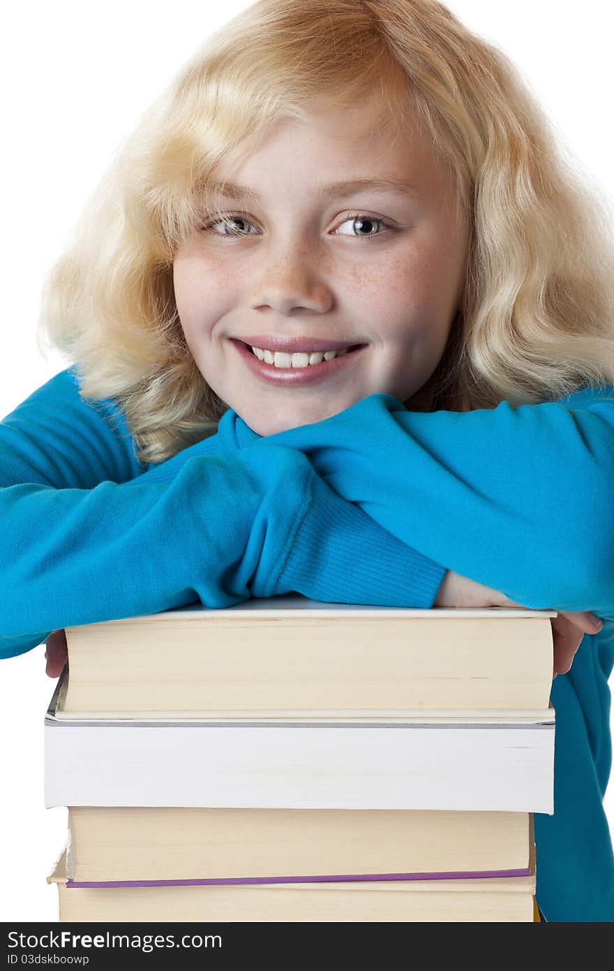 Portrait of a young beatiiful girl leaning on a pile of books.Isolated on white background. Portrait of a young beatiiful girl leaning on a pile of books.Isolated on white background.