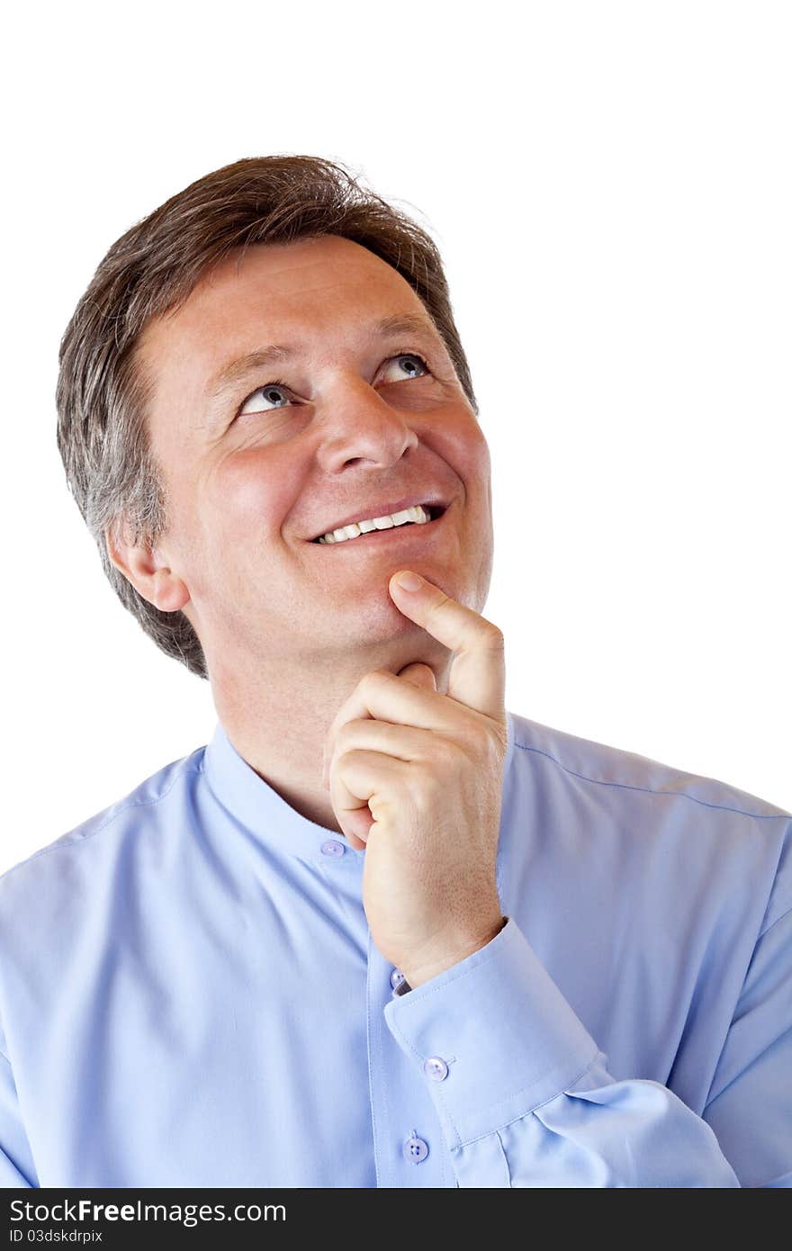 Attractive, aged man looks positive contemplative in the air. Isolated on white background.