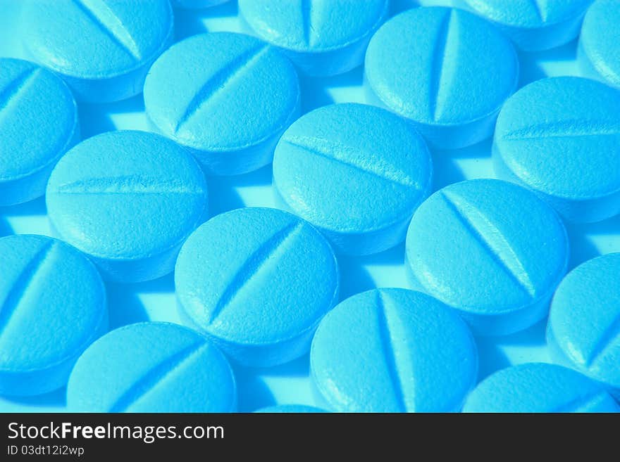 Pills background with blue lighting