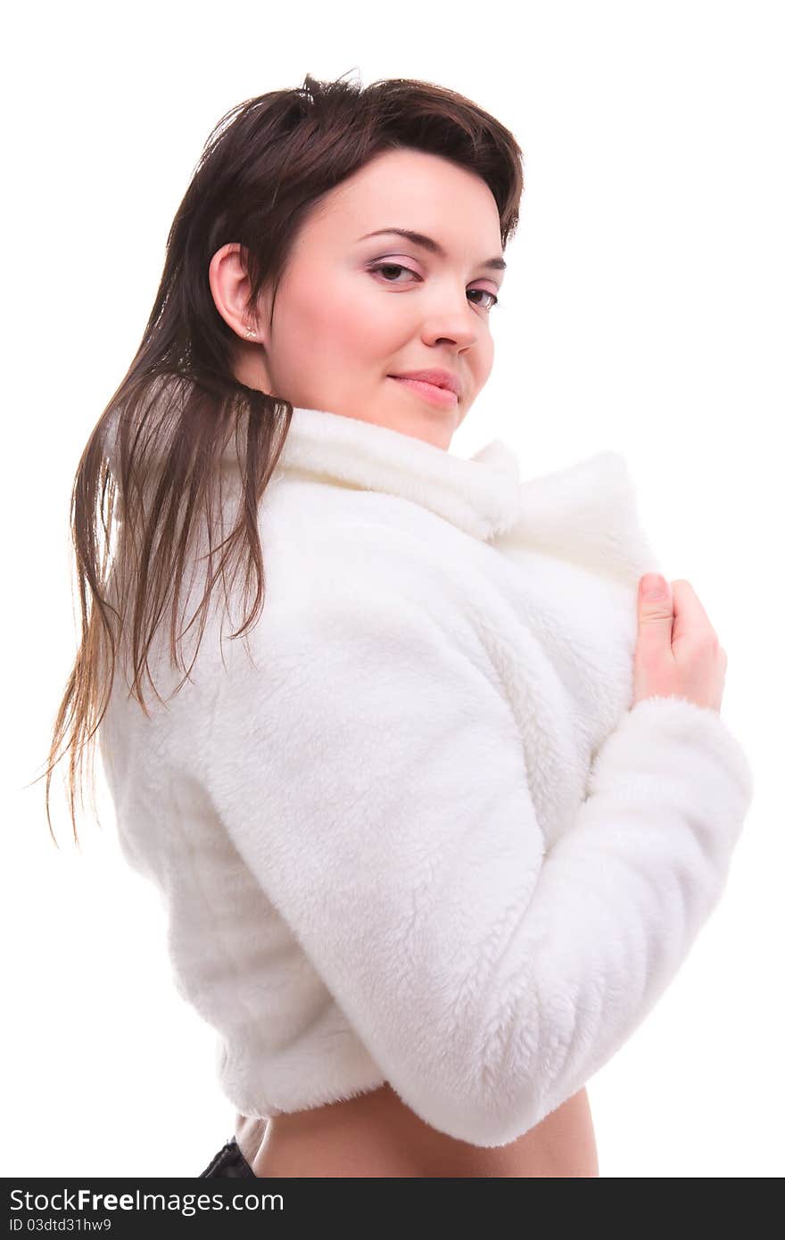 Cute young girl in a short white coat. Cute young girl in a short white coat