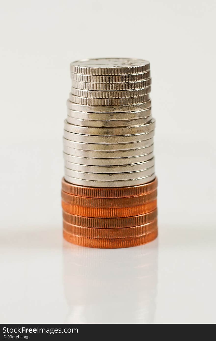 Stack of coins on white background