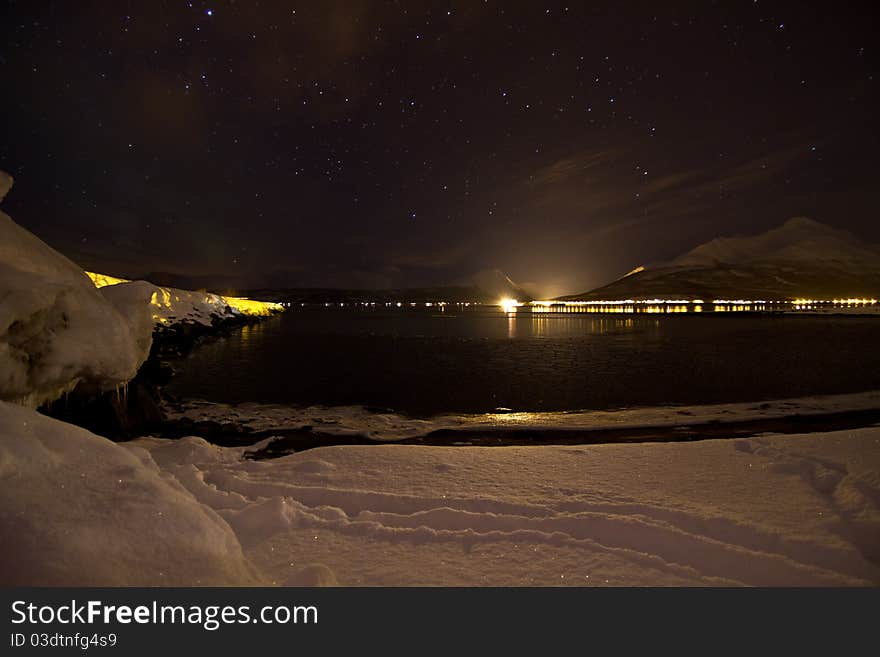 Weak Aurora Northern Light Over The Winter Sea