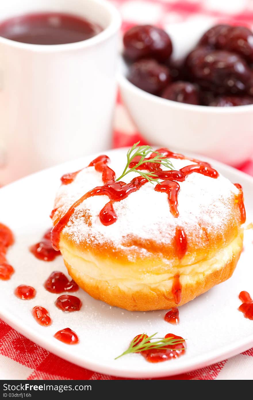 Delicious donut with jam and plums. Delicious donut with jam and plums