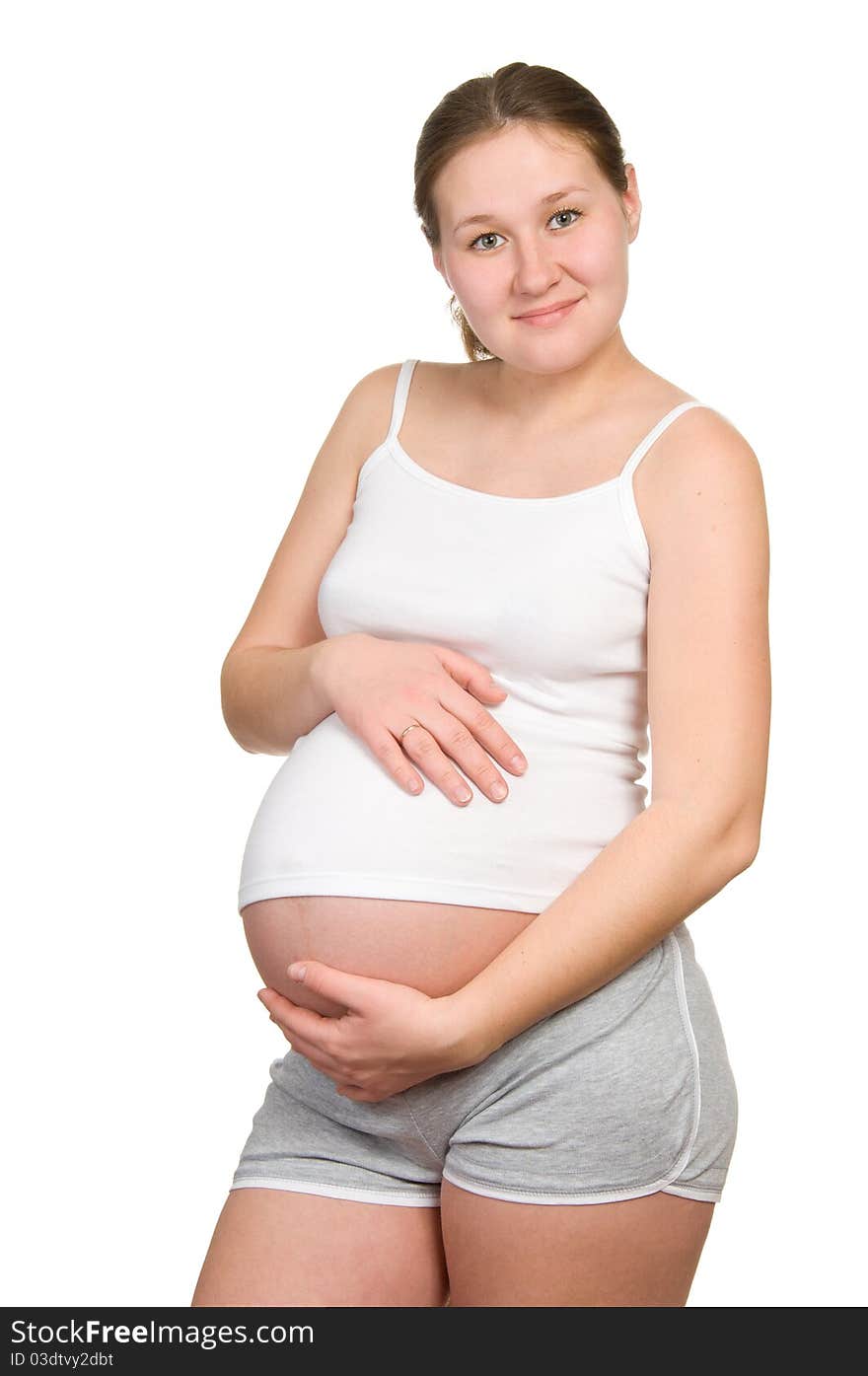 Adorable pregnant woman over white. Adorable pregnant woman over white