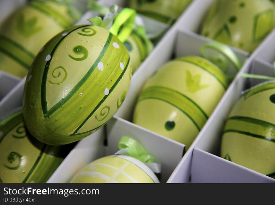 Green Easter eggs in a box