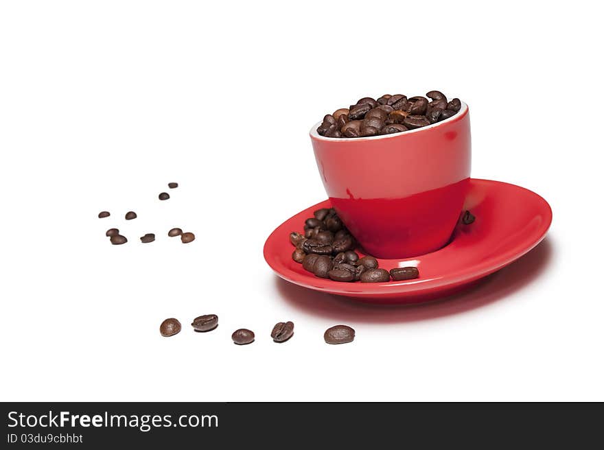 A cup full of coffee beans