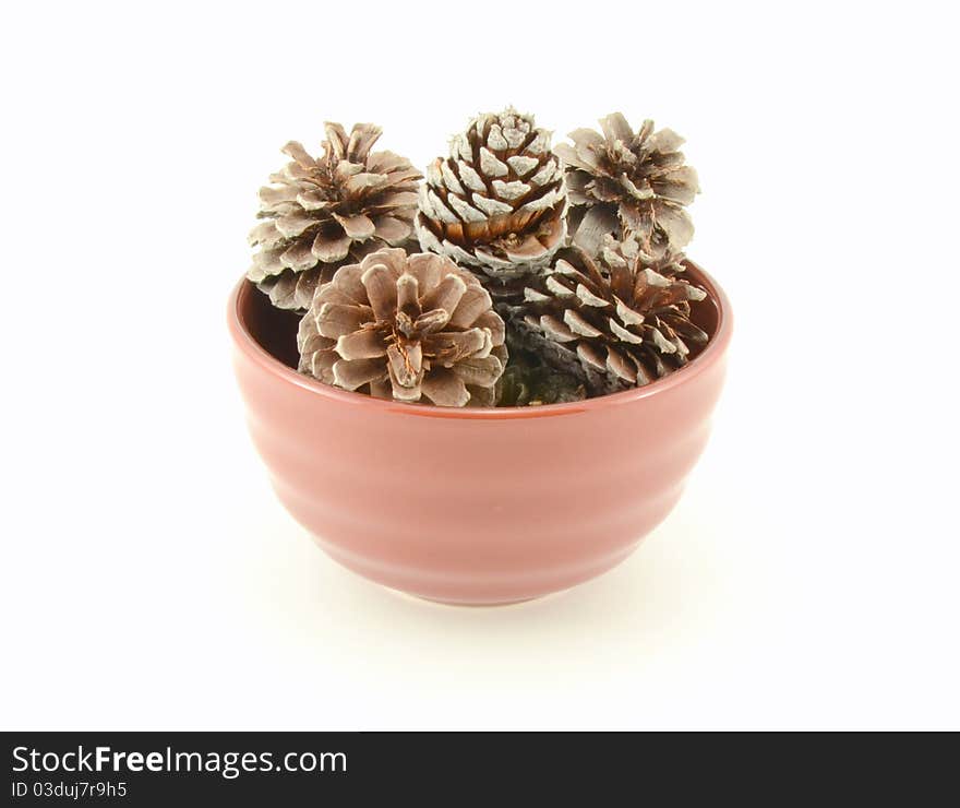 Pine Cones In Brown Bowl