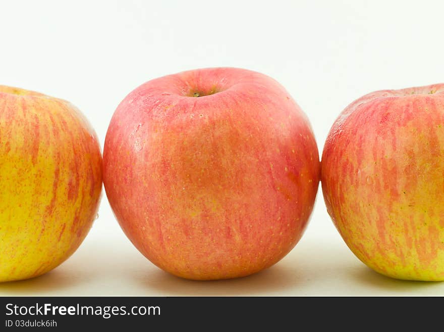 Three red apples isolated on white background. Three red apples isolated on white background