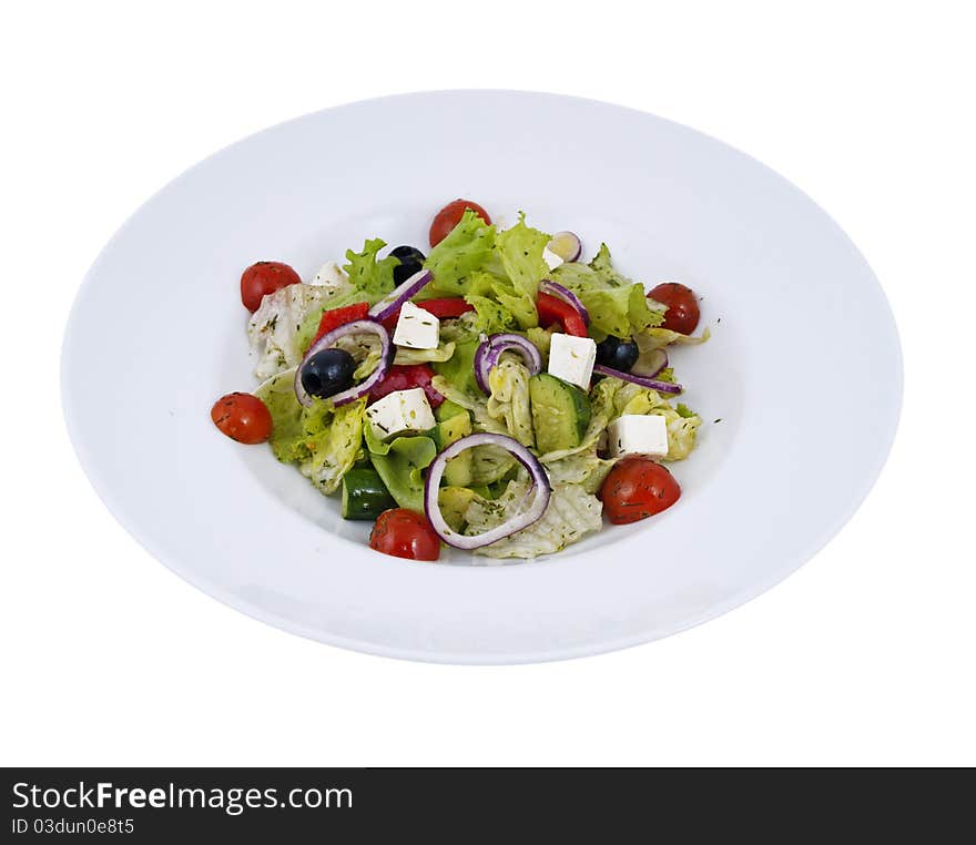 Juicy, fresh salad in a plate on a white background. Juicy, fresh salad in a plate on a white background