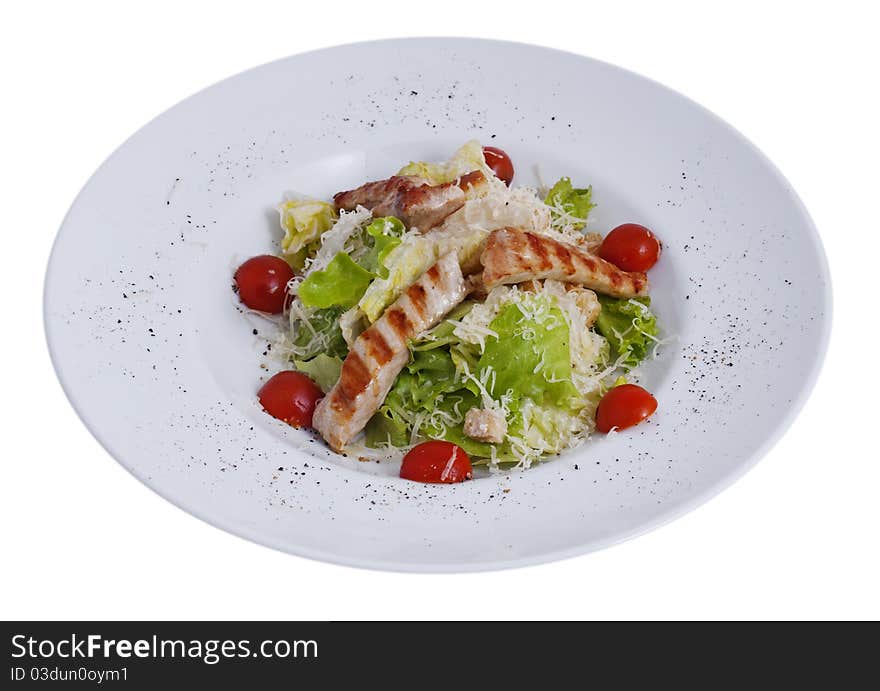 Juicy, fresh salad in a plate on a white background. Juicy, fresh salad in a plate on a white background