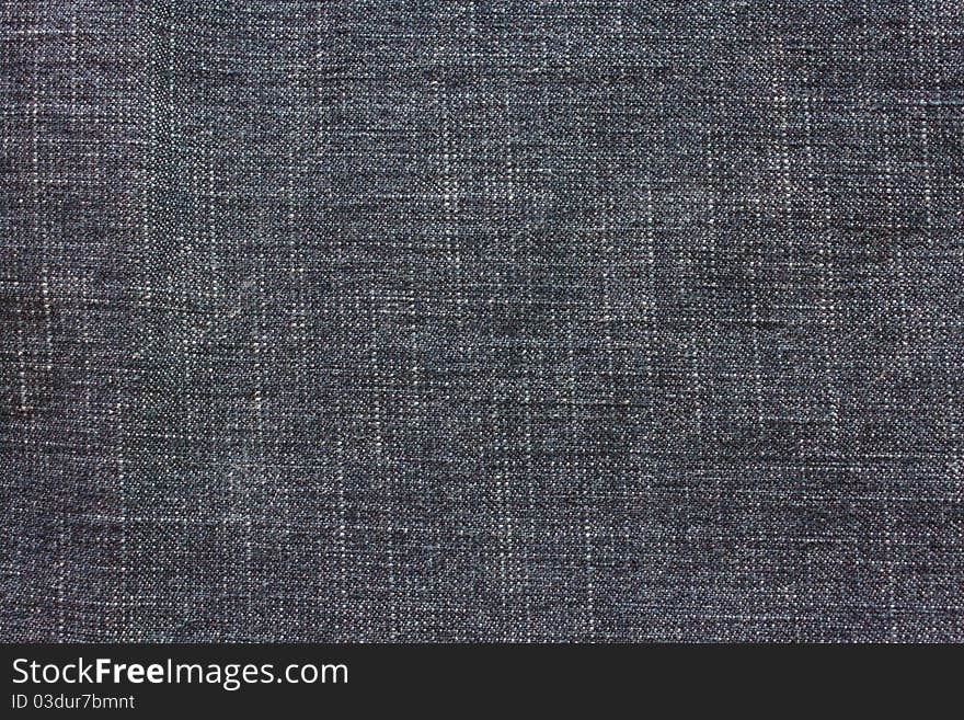 Close - up of the blue jeans background or texture