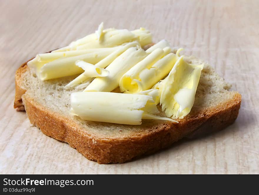 Buttered bread on the table