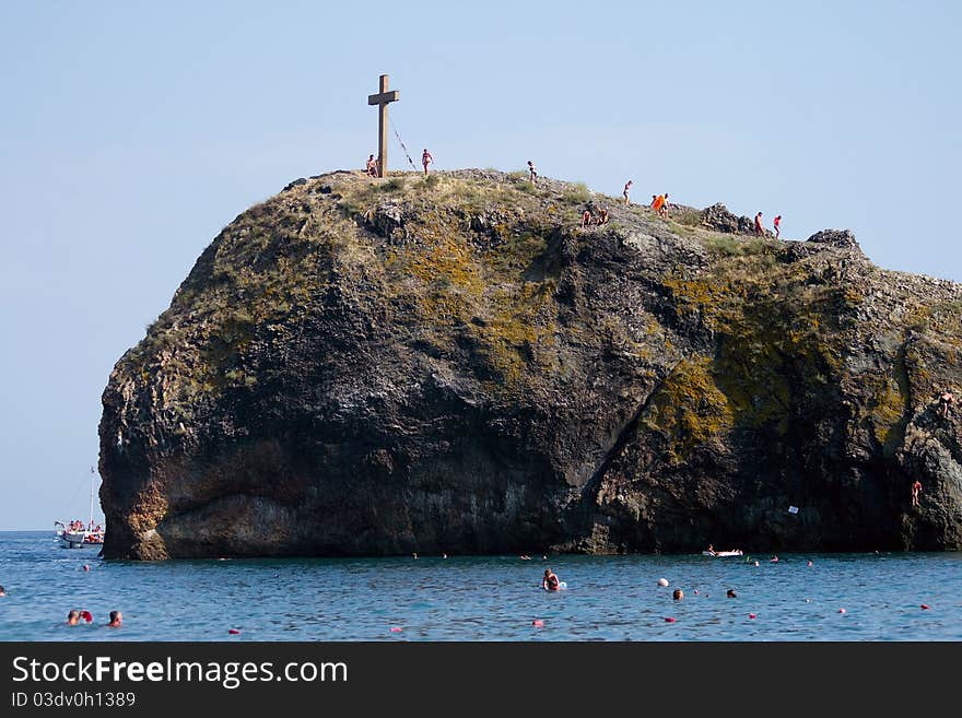 Limestone rock with christian cross