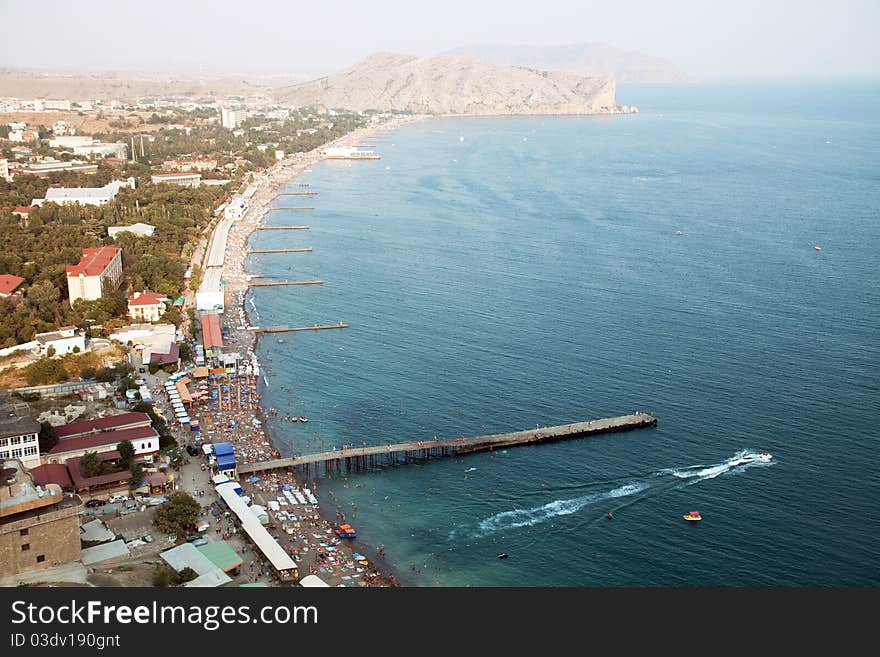 Bird's eye view of long beach and mountains