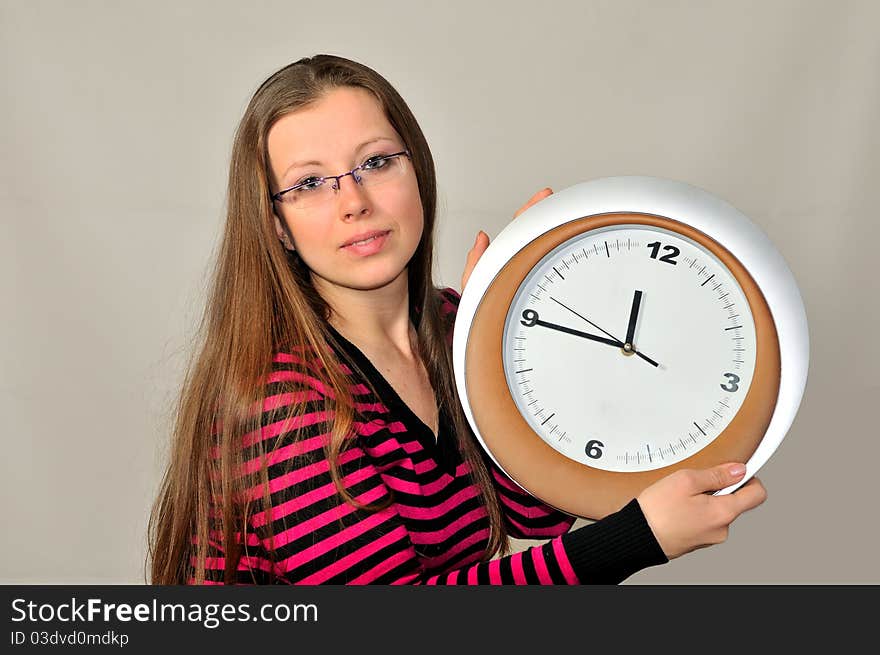 Girl with a watch in his hand