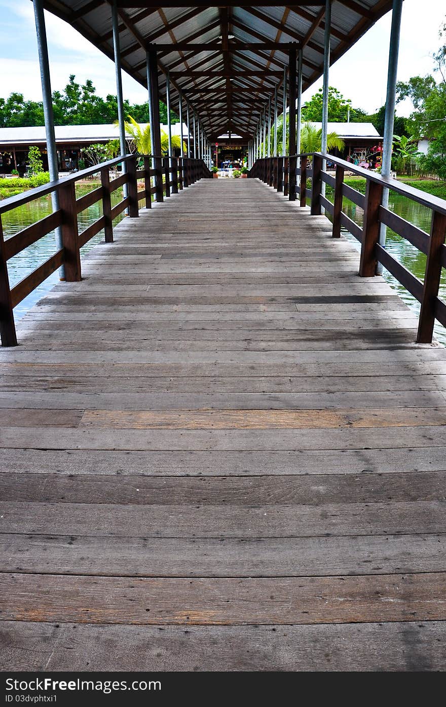 Modern wood bridge in the garden