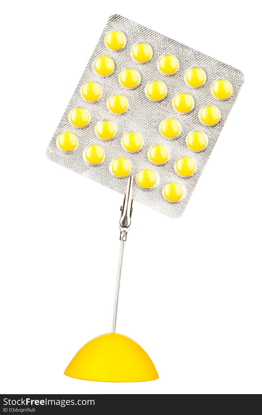 Yellow holder with pills in blister. Yellow holder with pills in blister