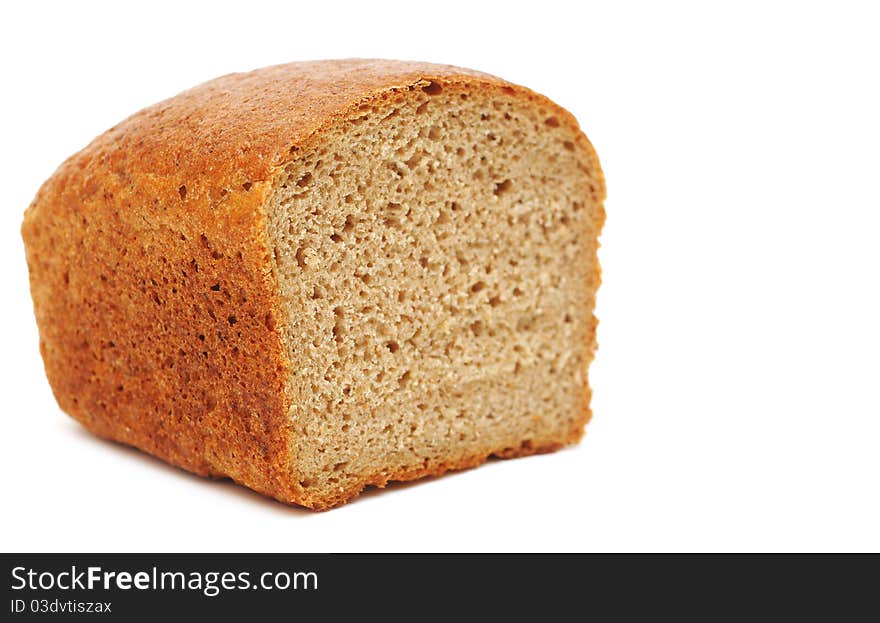 Half wheat bread round isolated on white