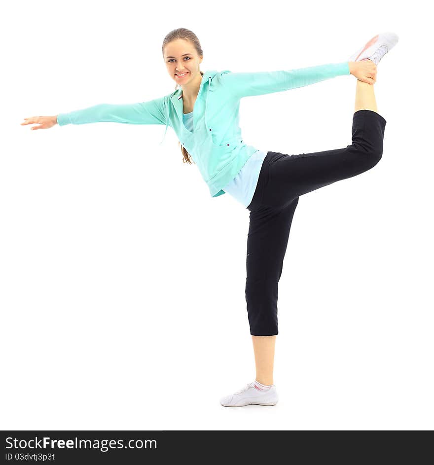 The beautiful young woman plays sports on a white background