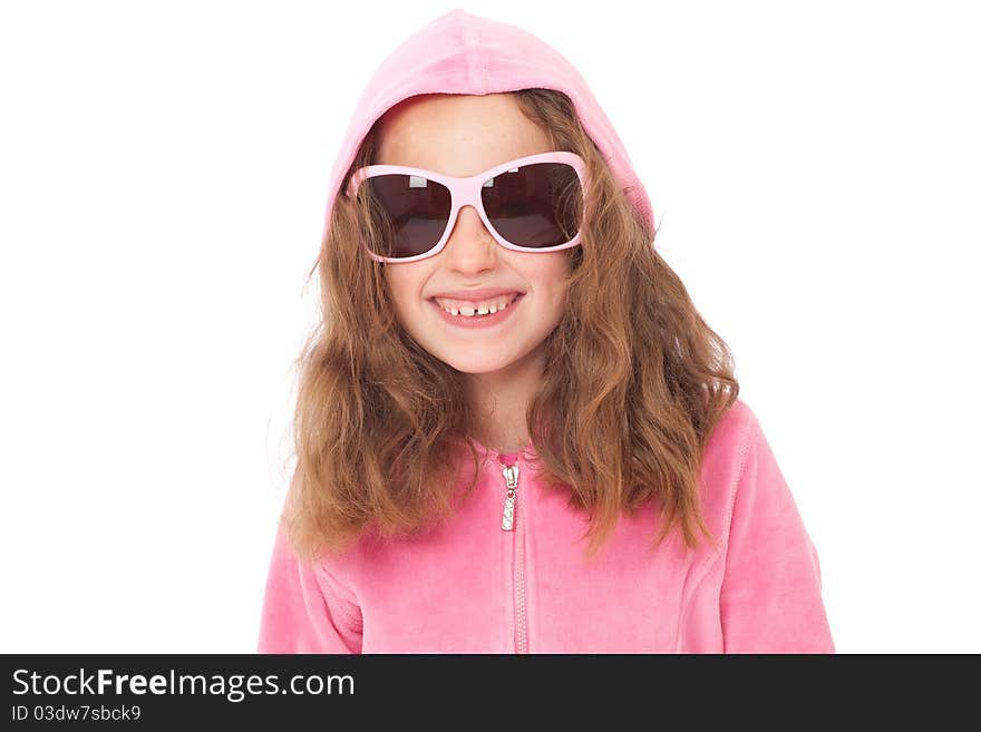 Young girl in pink top and sunglasses with funny face expression. Young girl in pink top and sunglasses with funny face expression