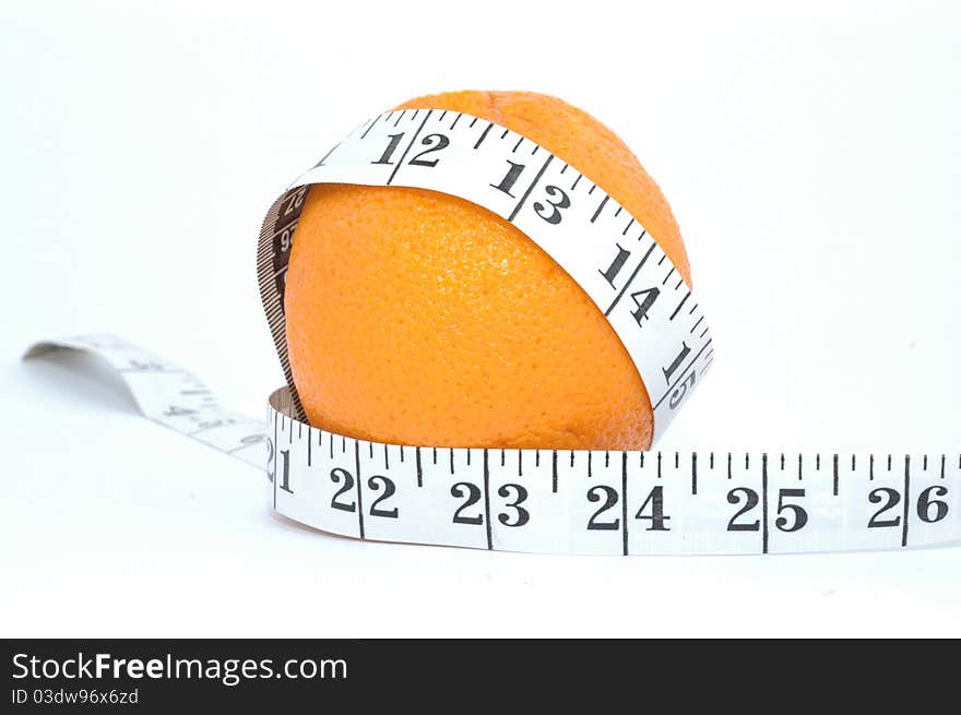 Orange and meter on a white background - Diet composition